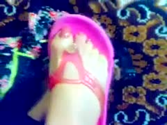 Observe me massaging my well-groomed feet against each other.